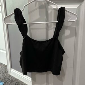 Black tank top crop top with frilled sleeves, size petite M. Never worn